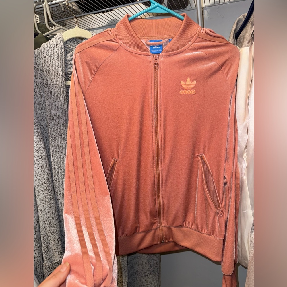 Rose colored track jacket